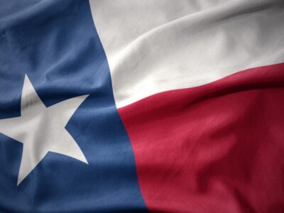 waving colorful flag of texas state. waving colorful flag of texas state.